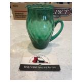 Vintage green glass bud vase