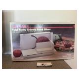 Fold away food slicer