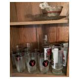 Collector glasses in cupboard bring boxes