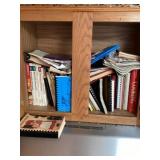Cupboard of cookbooks bring a box