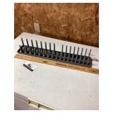 Metric socket holder