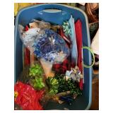 Tote of reusable bags and Christmas clothes and