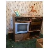 Entertainment center with contents untested come