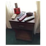 Nightstand with phone and remotes