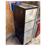 Metal four drawer file cabinet with contents