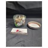 Jar of thimbles and trinkets