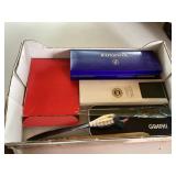 Assorted pens and letter openers