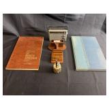 National Geographic atlases, radio, desk