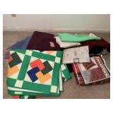 Assorted table, linens and blankets and bedding