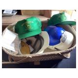 Vintage baby bassinet, hats, and other