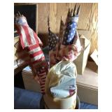Various American flags and galvanized buckets