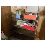 Vintage boy scout books and metal shelf