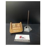 Vintage wooden desk calendar and receipt spike
