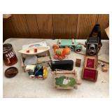 Assorted vintage items, toys, cameras, and other