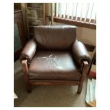 Brown wooden chair with matching loveseat