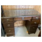 Small wooden desk with glass top