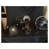 Vintage globe and vintage telephones