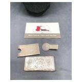 Money and tie clips marked 925