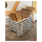 Wood box of brooms