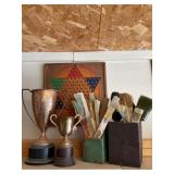 Trophyï¿½s, Chinese checker board, brushes and misc