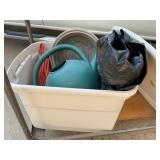 Tarp and garden misc in tote