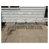 Four vintage metal chairs