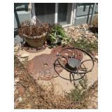 Metal garden decor and unknown plants
