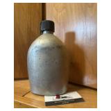 Vintage metal canteen marked US SMCO 1945