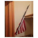American flag and rubber spear