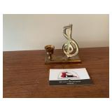Brass musical candle holder