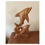 Wood dolphin statue