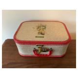 Vintage kids suitcase of doll clothes
