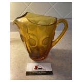 Amber glass coin pitcher