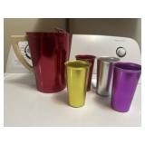 Vintage aluminum pitcher and glasses