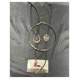 Bolos and necklace.  No markings