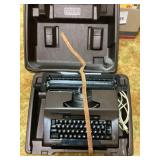Vintage typewriter and radio