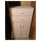 White cabinet and contents