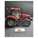 Tomy Case IH 150 plastic tractor