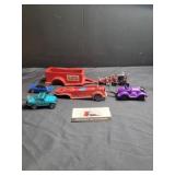 Assorted toy cars and trailers