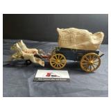 Cast iron covered wagon and horses