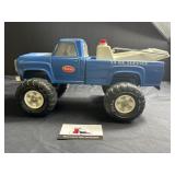 Vintage metal Tonka tow truck