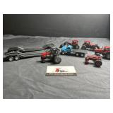 1/64 scale Case tractors and trailers