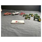 John Deere tractors and misc trucks