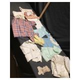 Child, clothes, and blankets