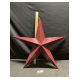 Metal star approximately 33 inches tall
