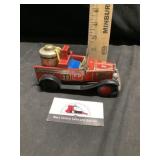 Pressed metal friction fire truck
