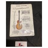 Metal iconic guitars sign 8 x 11 1/2 tall