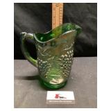 Harvest grape pitcher in green carnival glass