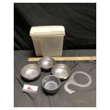 Stainless steel bowls and Rubbermaid storage