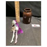 Stoneware crock and doll